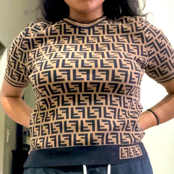 Hi! I’m am selling an authentic name brand Fendi sweater